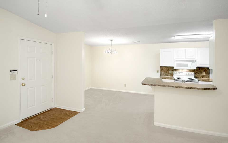 Entrance and kitchen and dining area Greystone Properties Columbus, GA Apartments at Green Island