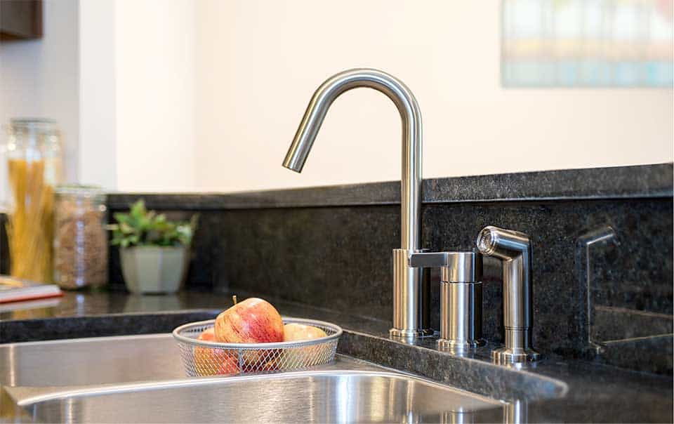 Kitchen sink and fixtures at Greystone Properties Columbus, GA apartments